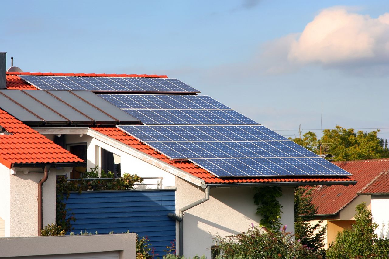Rooftop solar panels installed on a house for clean energy 2026