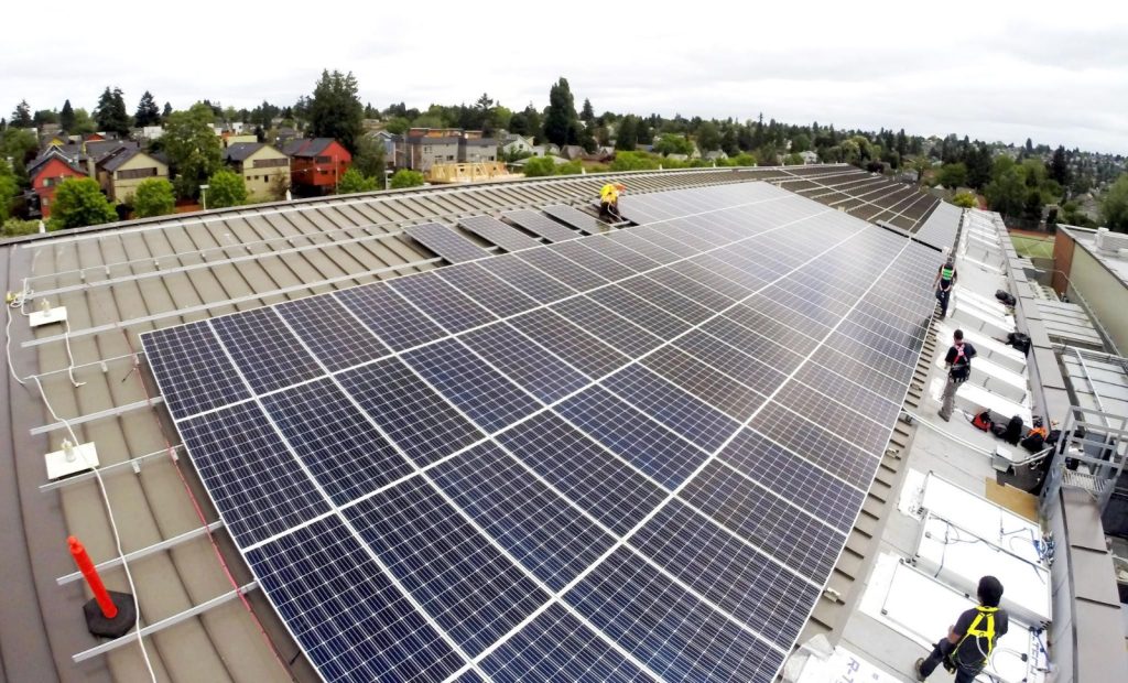 High-efficiency commercial solar energy solutions installed on a business facility to reduce energy costs and improve sustainability.